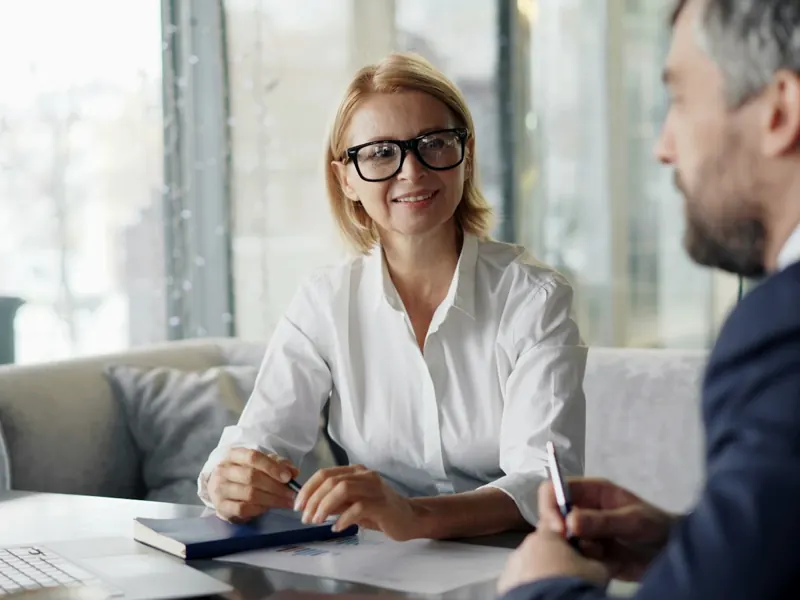 Insurance agent explaining a policy to a client